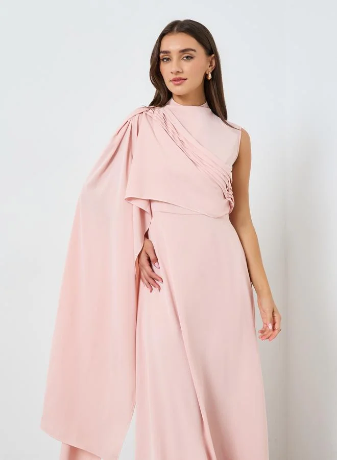 ستايلي فستان طويل بأكمام طويلة وتصميم كيب وواسع من الأسفل